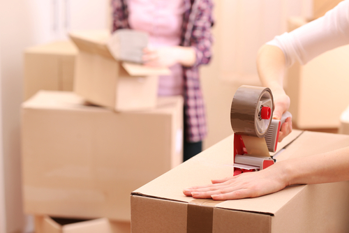 Packing and Taping New Boxes for Storage of your Belongings