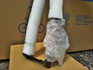 Bubble wrap works well too to wrap the front fork of your bike