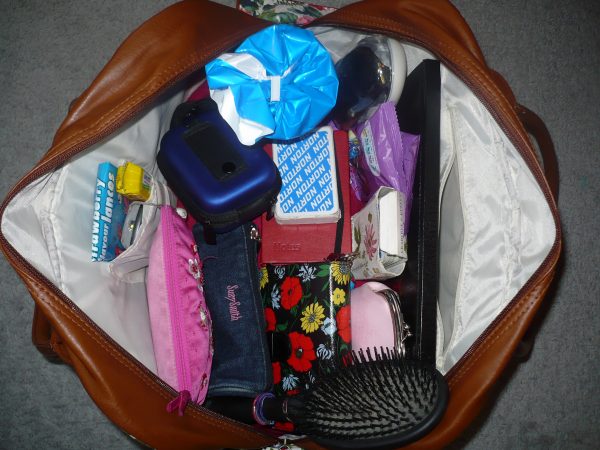 A picture containing indoor, items, clothes, cluttered

Description automatically generated