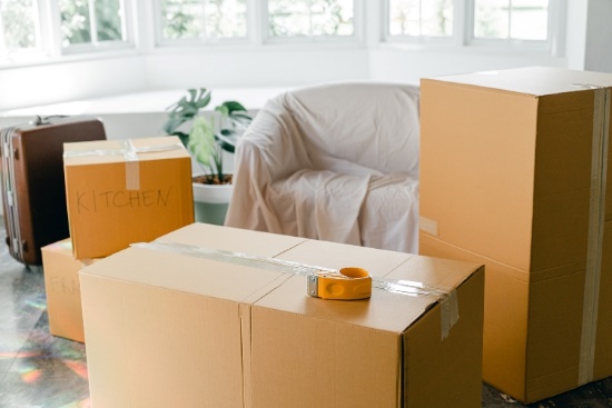 Boxes and a sofa inside a room