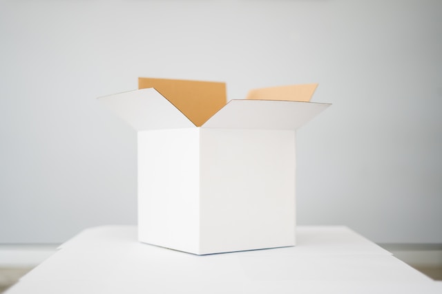 An open white cardboard box