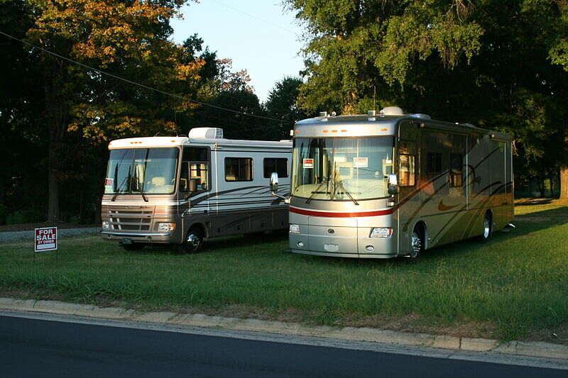 Buses parked in grass

Description automatically generated with medium confidence