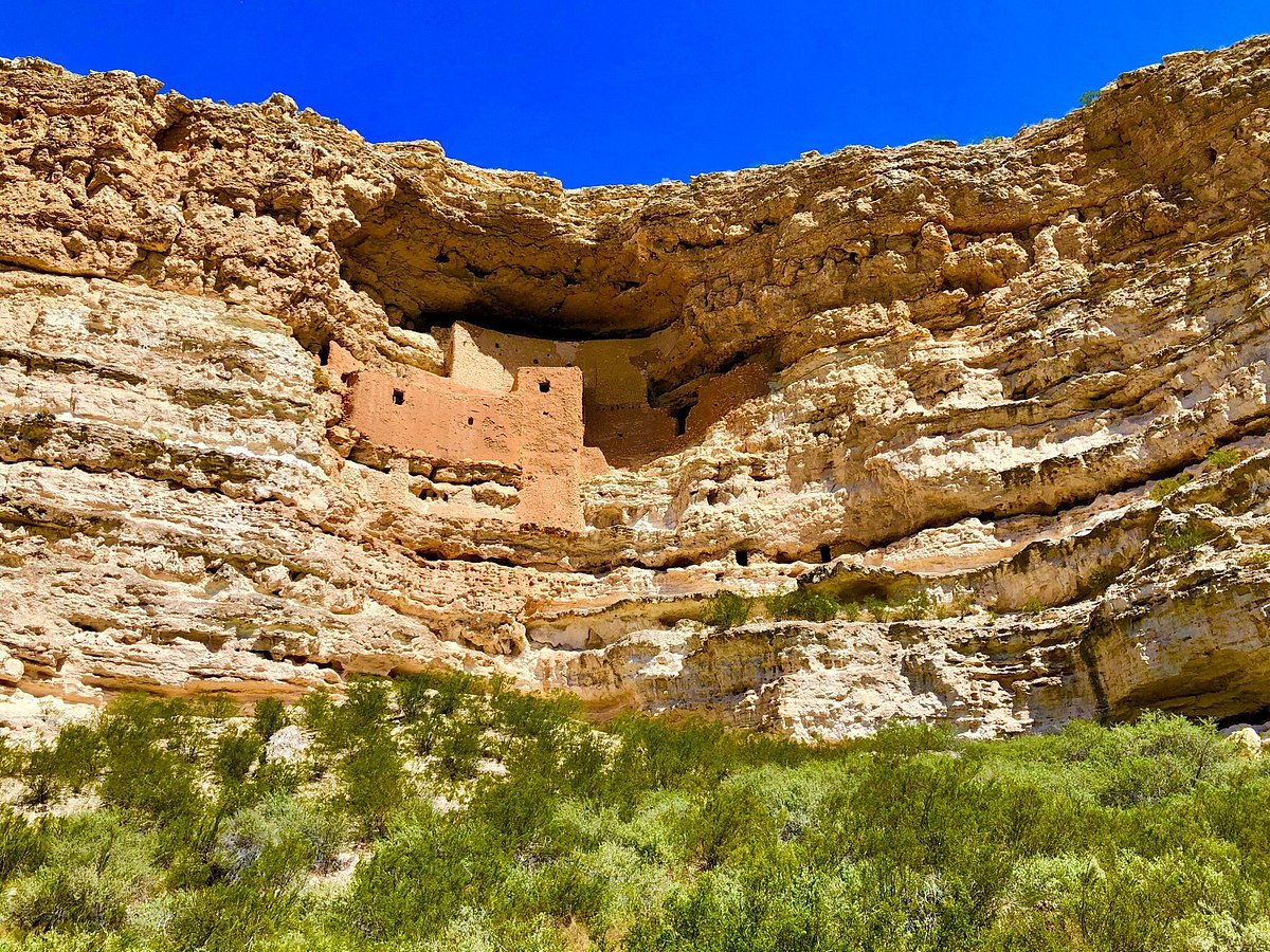 A cliff with Montezuma Castle National Monument in the side